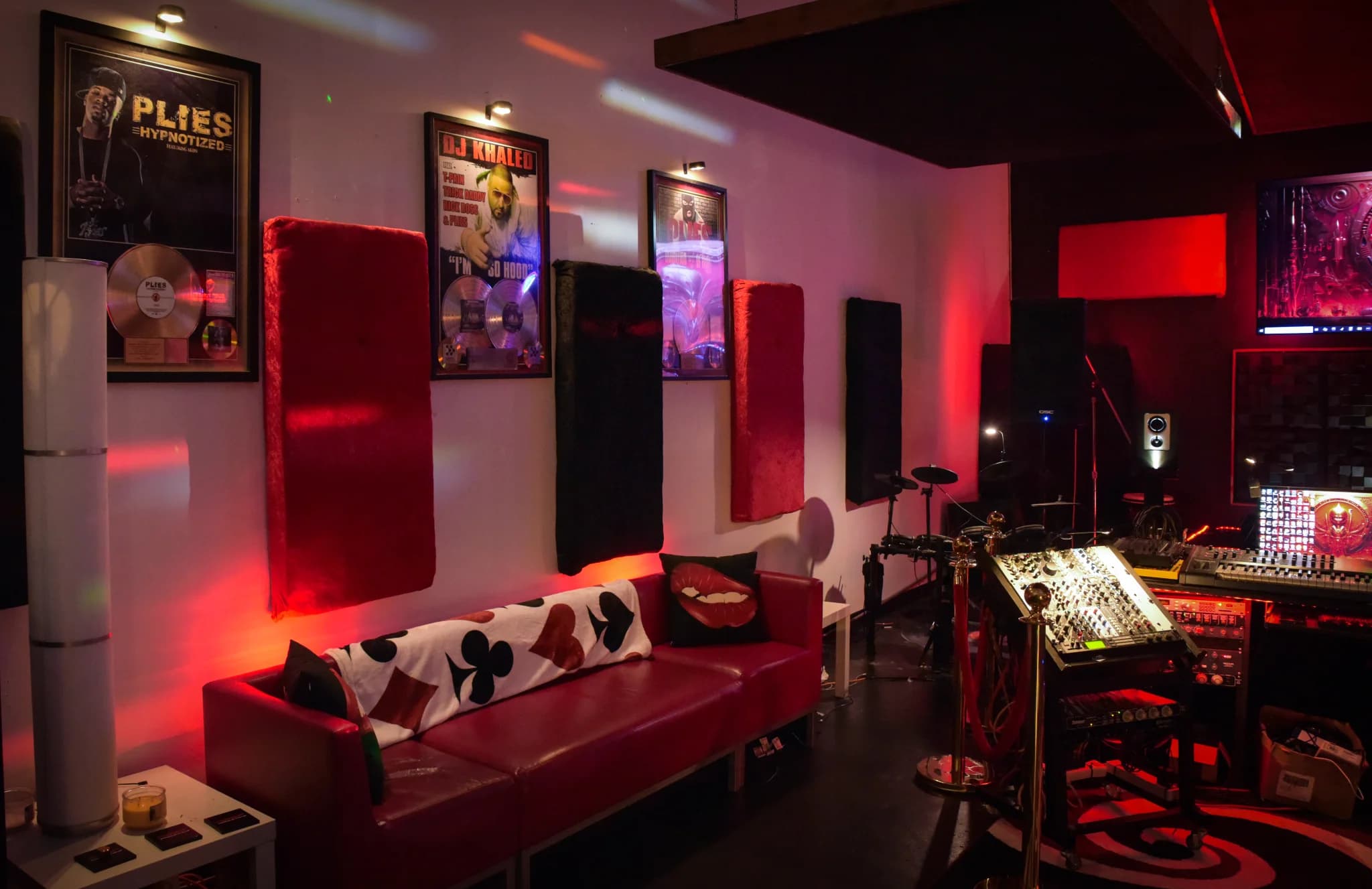 Studio lounge with DJ Khaled plaque on the wall