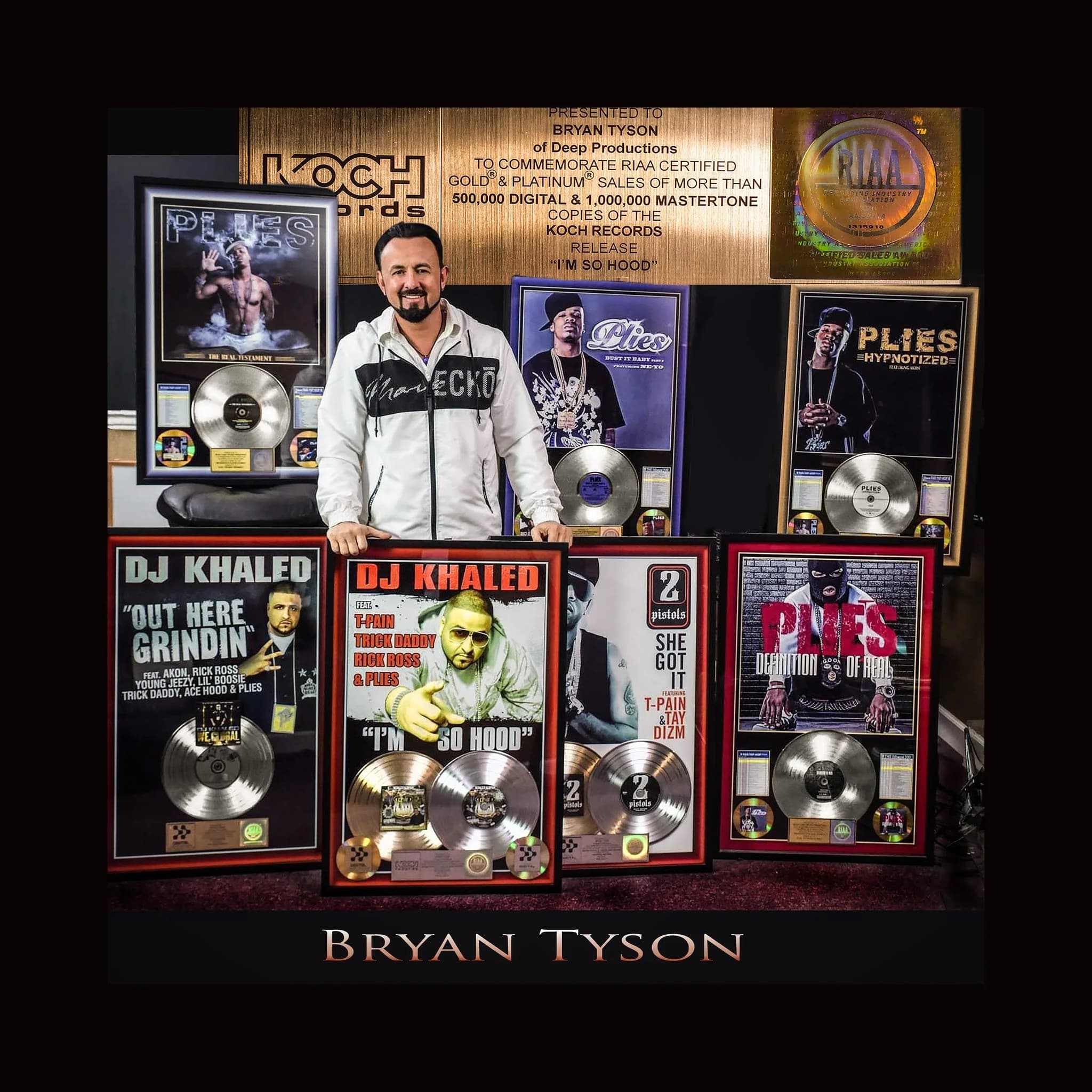 Platinum and gold record plaques on the wall at Deep Productions