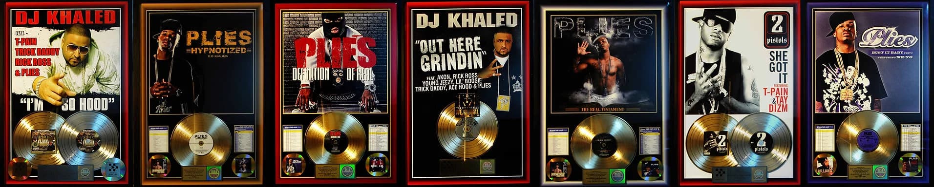 Platinum and gold record plaques on the wall at Deep Productions